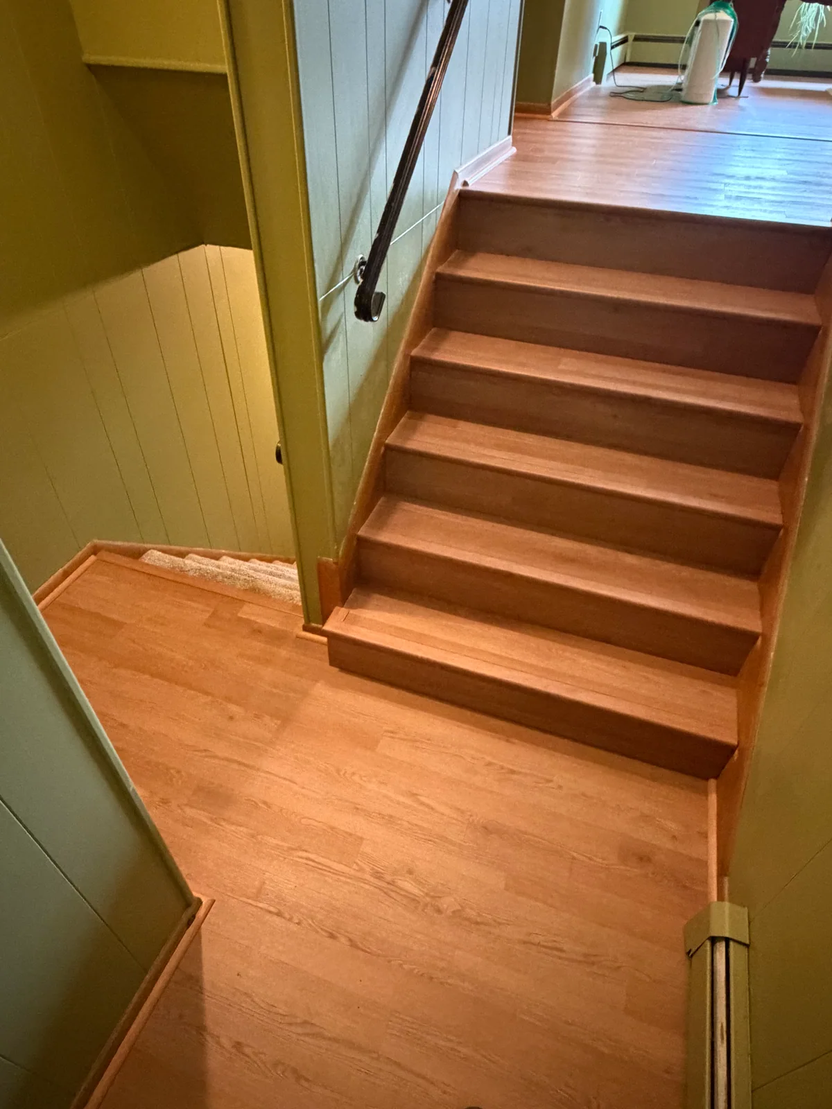 Flooring on a stair landing and adjoining steps